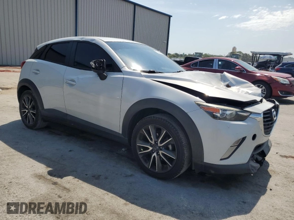 2017 Mazda CX-3 Touring z VIN JM1DKDC75H0168823, wystawiony jako Copart lot #57968955 z przebiegiem 116 231 mil mil oraz Szkoda całkowita • Salvage title. Historia ofert i sprzedaży dostępna na DreamBid. Obrazek 4.
