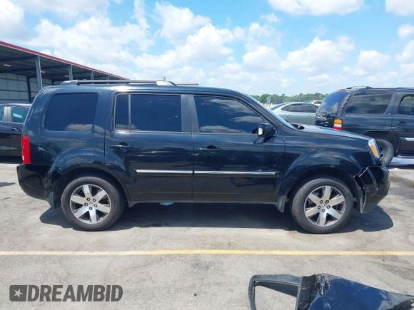 2013 Honda Pilot Touring z VIN 5FNYF3H98DB023104, wystawiony jako IAAI lot #42310538 z przebiegiem 169 385 mil mil oraz . Historia ofert i sprzedaży dostępna na DreamBid. Obrazek 13.