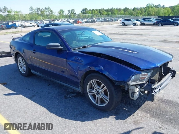 2012 Ford Mustang V6 Premium with VIN 1ZVBP8AM5C5244459, listed as a IAAI auction lot 41920863 with 127,034 mi miles. Bid and sale history available at carsss.com. Image 1.