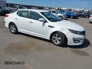 2015 Kia Optima LX z VIN KNAGM4A76F5597167, wystawiony jako IAAI lot #41896660 z przebiegiem 82 939 mil mil oraz . Historia ofert i sprzedaży dostępna na DreamBid. Obrazek 1.