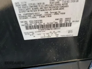 2015 Ford Taurus SEL with VIN 1FAHP2E86FG130511, listed as a Copart auction lot 60545805 with 99,215 mi miles and Salvage title. Bid and sale history available at DreamBid. Image 12.