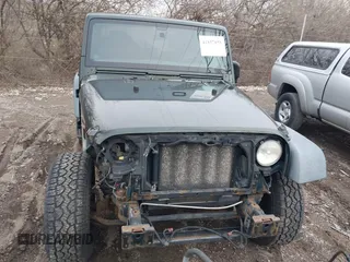 2011 Jeep Wrangler Sport with VIN 1J4AA2D18BL588273, listed as a IAAI auction lot 41857858 with 136,473 mi miles and . Bid and sale history available at carsss.com. Image 12.