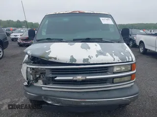 2002 Chevrolet Express Cargo with VIN 1GCHG35R621159402, listed as a IAAI auction lot 42170093 with Not provided miles and . Bid and sale history available at DreamBid. Image 12.