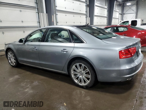 2014 Audi A8 3.0T z VIN WAURGAFD7EN005416, wystawiony jako Copart lot #42625745 z przebiegiem 141 244 mil mil oraz Szkoda całkowita • Salvage title. Historia ofert i sprzedaży dostępna na DreamBid. Obrazek 2.