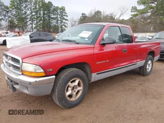 1998 Dodge Dakota SLT with VIN 1B7GL22Y1WS569991, listed as a IAAI auction lot 41689076 with 135,680 mi miles and . Bid and sale history available at DreamBid. Image 2.