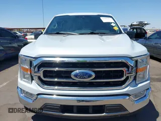 2021 Ford F-150 XL with VIN 1FTEW1CP4MKD82871, listed as a IAAI auction lot 42301025 with 54,757 mi miles and . Bid and sale history available at DreamBid. Image 13.