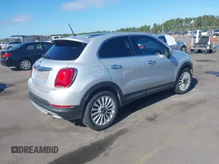 2016 FIAT 500X Lounge z VIN ZFBCFXDT2GP363767, wystawiony jako IAAI lot #37885612 z przebiegiem 74 859 mil mil oraz . Historia ofert i sprzedaży dostępna na DreamBid. Obrazek 4.