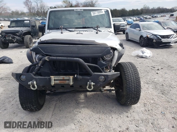 2008 Jeep Wrangler Sahara with VIN 1J4FA54148L561961, listed as a Copart auction lot 50770895 with 126,516 mi miles and Salvage title. Bid and sale history available at DreamBid. Image 5.