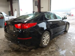 2014 Kia Optima EX z VIN 5XXGN4A75EG339104, wystawiony jako IAAI lot #42311979 z przebiegiem 115 119 mil mil oraz . Historia ofert i sprzedaży dostępna na DreamBid. Obrazek 4.