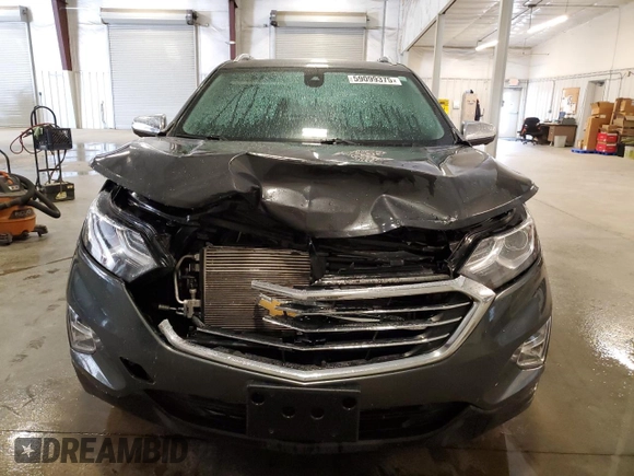 2019 Chevrolet Equinox Premier z VIN 3GNAXYEX6KL195023, wystawiony jako Copart lot #59099375 z przebiegiem 95 586 mil mil oraz Szkoda całkowita • Salvage title. Historia ofert i sprzedaży dostępna na DreamBid. Obrazek 5.