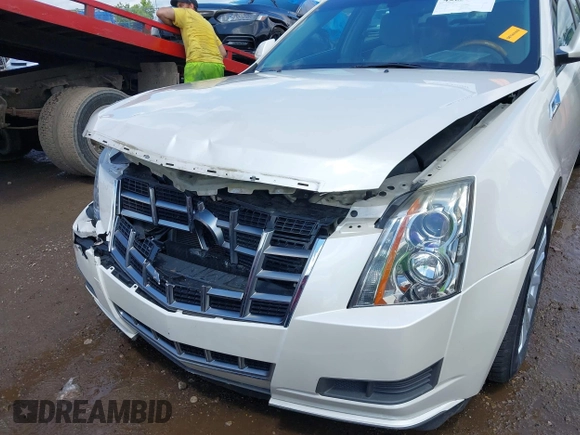 2012 Cadillac CTS Luxury with VIN 1G6DG5E57C0137409, listed as a IAAI auction lot 42633890 with 86,886 mi miles and . Bid and sale history available at DreamBid. Image 6.