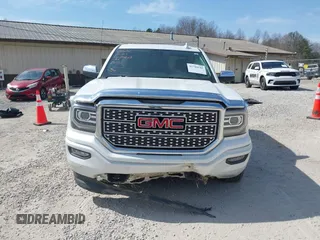 2017 GMC Sierra 1500 Denali with VIN 3GTU2PEC5HG164021, listed as a IAAI auction lot 41784101 with 69,167 mi miles and . Bid and sale history available at DreamBid. Image 13.