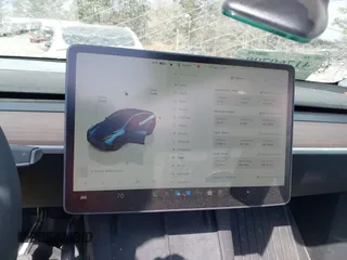 2025 Tesla Model Y Long Range with VIN 7SAYGDED3SA352138, listed as a IAAI auction lot 41760798 with 1,209 mi miles and . Bid and sale history available at DreamBid. Image 17.