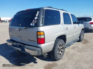 2005 Chevrolet Tahoe LT with VIN 1GNEC13T85J254296, listed as a IAAI auction lot 41676900 with 214,305 mi miles. Bid and sale history available at carsss.com. Image 4.