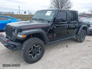 2022 Jeep Gladiator Rubicon with VIN 1C6JJTBG7NL145501, listed as a IAAI auction lot 41506842 with 20,593 mi miles. Bid and sale history available at carsss.com. Image 2.