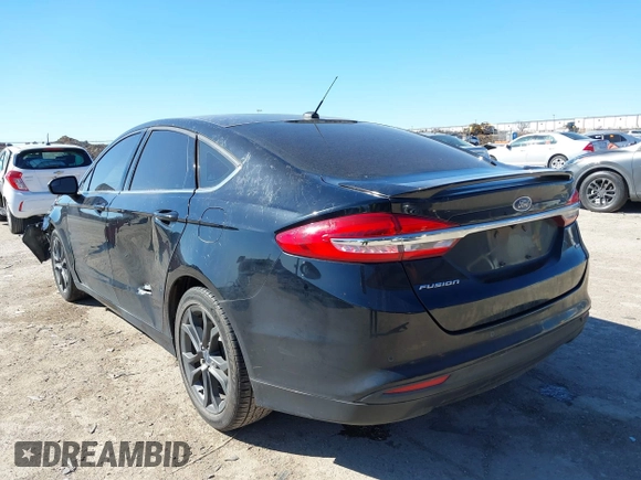 2018 Ford Fusion SE z VIN 3FA6P0H77JR180057, wystawiony jako IAAI lot #41729451 z przebiegiem 122 200 mil mil oraz . Historia ofert i sprzedaży dostępna na DreamBid. Obrazek 3.