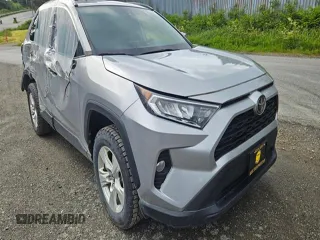 2021 Toyota RAV4 XLE with VIN 2T3P1RFV7MW161787, listed as a Copart auction lot 60937395 with 91,377 mi miles and Salvage title. Bid and sale history available at DreamBid. Image 4.