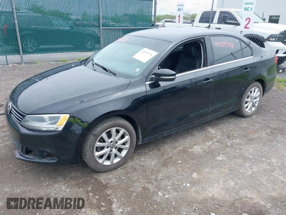 2013 Volkswagen Jetta SE z VIN 3VWDX7AJ5DM258429, wystawiony jako IAAI lot #42372776 z przebiegiem 211 579 mil mil oraz . Historia ofert i sprzedaży dostępna na DreamBid. Obrazek 2.