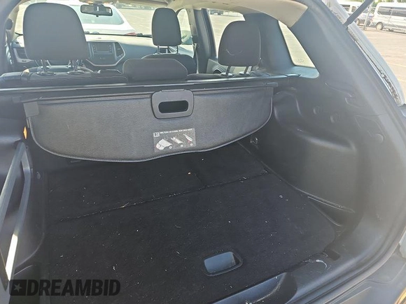 2017 Jeep Cherokee Sport with VIN 1C4PJLABXHW660505, listed as a IAAI auction lot 42680671 with 98,907 mi miles and . Bid and sale history available at DreamBid. Image 3.