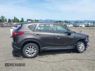 2016 Mazda CX-5 Sport with VIN JM3KE4BY8G0785812, listed as a IAAI auction lot 42324083 with 57,405 mi miles and . Bid and sale history available at DreamBid. Image 13.