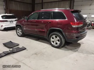 2018 Jeep Grand Cherokee Laredo E with VIN 1C4RJFAG9JC359284, listed as a IAAI auction lot 41032232 with 163,679 mi miles. Bid and sale history available at carsss.com. Image 3.