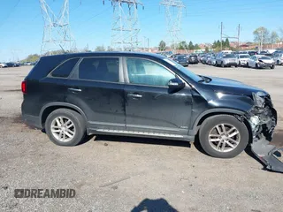2015 Kia Sorento LX with VIN 5XYKTCA63FG614211, listed as a IAAI auction lot 42041969 with 133,264 mi miles and . Bid and sale history available at carsss.com. Image 14.