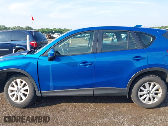 2014 Mazda CX-5 Sport z VIN JM3KE4BE7E0351982, wystawiony jako IAAI lot #42767499 z przebiegiem 154 774 mil mil oraz . Historia ofert i sprzedaży dostępna na DreamBid. Obrazek 14.