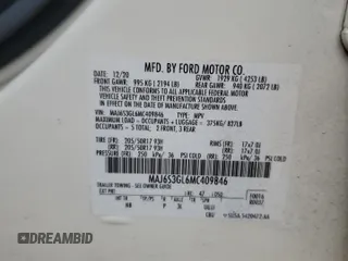 2021 Ford EcoSport SE with VIN MAJ6S3GL6MC409846, listed as a Copart auction lot 54111455 with 61,691 mi miles and Salvage title. Bid and sale history available at DreamBid. Image 13.
