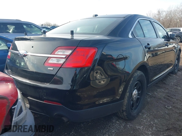 2016 Ford Police Interceptor with VIN 1FAHP2MKXGG136620, listed as a IAAI auction lot 41614416 with 106,149 mi miles and . Bid and sale history available at DreamBid. Image 4.