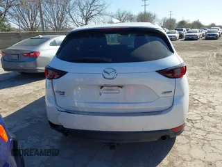 2017 Mazda CX-5 Touring with VIN JM3KFBCL8H0152748, listed as a IAAI auction lot 41732910 with 68,296 mi miles. Bid and sale history available at carsss.com. Image 16.