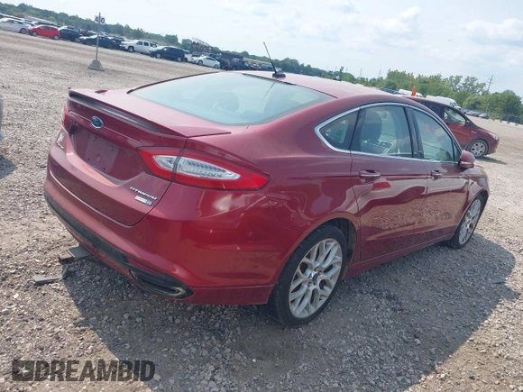 2013 Ford Fusion Titanium with VIN 3FA6P0D98DR333167, listed as a IAAI auction lot 39914722 with 200,851 mi miles. Bid and sale history available at carsss.com. Image 4.
