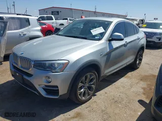 2016 BMW X4 xDrive35i with VIN 5UXXW5C50G0N91649, listed as a IAAI auction lot 41897744 with 92,619 mi miles. Bid and sale history available at carsss.com. Image 2.