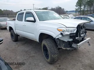 2023 Toyota Tacoma 4WD SR with VIN 3TMCZ5AN3PM547877, listed as a IAAI auction lot 41649911 with 22,482 mi miles. Bid and sale history available at carsss.com. Image 1.