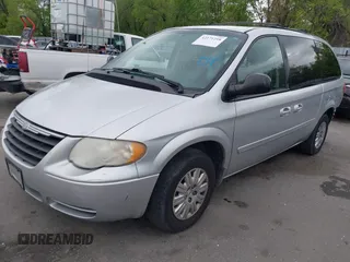 2007 Chrysler Town & Country with VIN 2A4GP44R27R191148, listed as a IAAI auction lot 42171218 with 150,670 mi miles and . Bid and sale history available at DreamBid. Image 19.