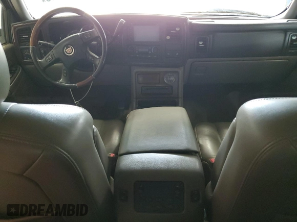 2006 Cadillac Escalade z VIN 1GYEK63N56R139033, wystawiony jako Copart lot #59661465 z przebiegiem Nie podano mil oraz Czysty tytuł • Clean title. Historia ofert i sprzedaży dostępna na DreamBid. Obrazek 8.