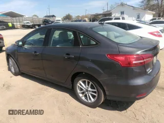 2015 Ford Focus SE with VIN 1FADP3F28FL292520, listed as a IAAI auction lot 41906723 with 74,106 mi miles. Bid and sale history available at carsss.com. Image 3.