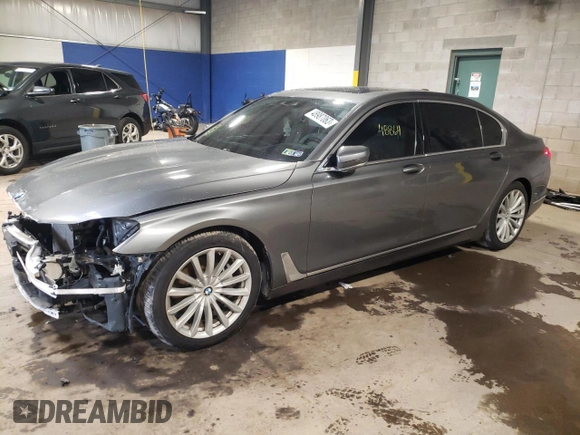 2018 BMW 7 Series 740i xDrive with VIN WBA7E4C5XJGV24275, listed as a Copart auction lot 48987063 with 48,864 mi miles. Bid and sale history available at carsss.com. Image 1.
