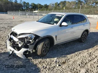 2014 BMW X5 xDrive50i with VIN 5UXKR6C54E0C02745, listed as a Copart auction lot 49086865 with 86,273 mi miles and Salvage Title. Bid and sale history available at carsss.com. Image 1.