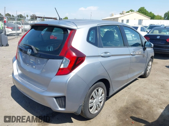 2017 Honda Fit LX with VIN JHMGK5H51HS023212, listed as a IAAI auction lot 42153107 with 106,778 mi miles. Bid and sale history available at carsss.com. Image 4.