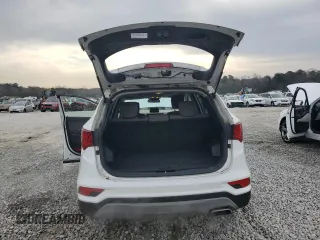 2018 Hyundai Santa Fe 2.4L z VIN 5NMZT3LB5JH092883, wystawiony jako Copart lot #48522495 z przebiegiem 69 745 mil mil oraz Szkoda całkowita • Salvage title. Historia ofert i sprzedaży dostępna na DreamBid. Obrazek 6.