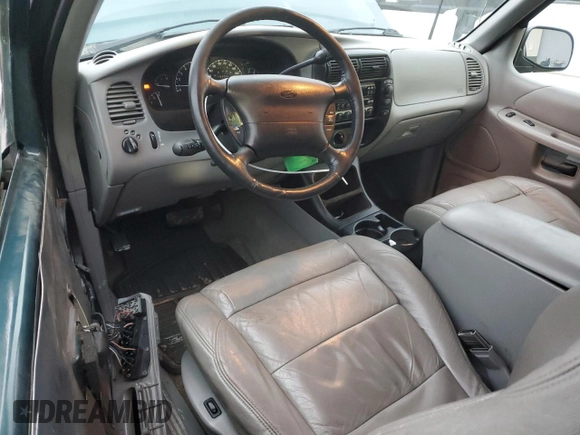 1997 Ford Explorer with VIN 1FMCU24E5VUB71602, listed as a Copart auction lot 87081674 with 193,534 mi miles and Salvage title. Bid and sale history available at DreamBid. Image 8.