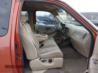 2001 Ford F-150 XL z VIN 1FTRX17W61NA63398, wystawiony jako IAAI lot #41882852 z przebiegiem 179 573 mil mil oraz . Historia ofert i sprzedaży dostępna na DreamBid. Obrazek 5.