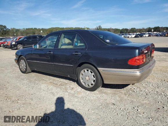 1998 Mercedes-Benz E 320 with VIN WDBJF25F3WA578364, listed as a Copart auction lot 77551834 with 228,913 mi miles and Salvage Title. Bid and sale history available at DreamBid. Image 2.