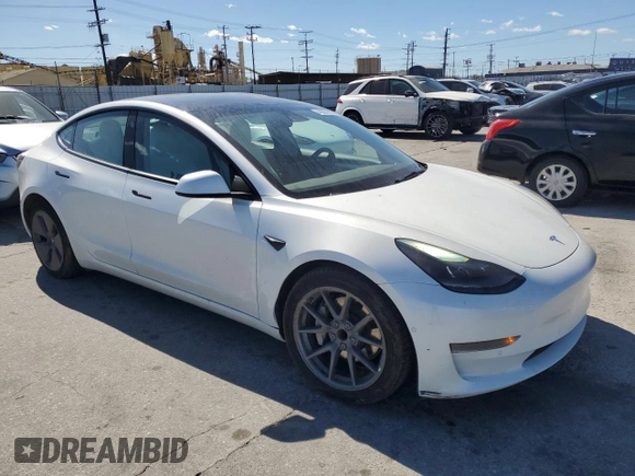 2022 Tesla Model 3 with VIN 5YJ3E1EAXNF203914, listed as a Copart auction lot 46982935 with 70,766 mi miles and Salvage Title. Bid and sale history available at DreamBid. Image 4.
