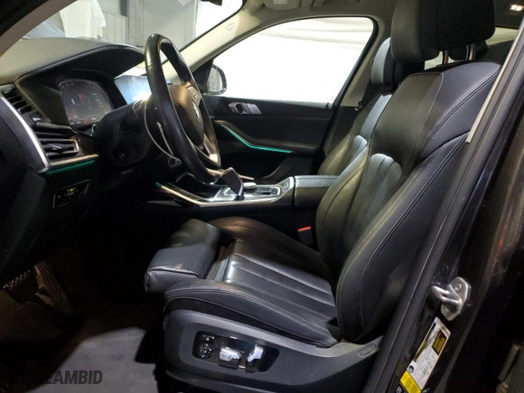 2019 BMW X7 xDrive40i with VIN 5UXCW2C59KL088447, listed as a Copart auction lot 54195265 with 74,390 mi miles and Clean Title. Bid and sale history available at carsss.com. Image 7.