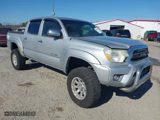2013 Toyota Tacoma PreRunner with VIN 3TMJU4GN1DM154026, listed as a IAAI auction lot 40959317 with 119,065 mi miles. Bid and sale history available at carsss.com. Image 1.