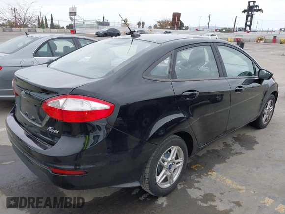 2017 Ford Fiesta SE z VIN 3FADP4BJ7HM145271, wystawiony jako IAAI lot #42056576 z przebiegiem 128 847 mil mil oraz . Historia ofert i sprzedaży dostępna na DreamBid. Obrazek 4.