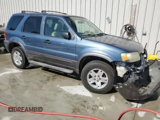 2006 Ford Escape XLT с VIN 1FMCU03176KA57097, выставлен на аукционе Copart как лот 52607965 с пробегом 255 230 миль миль и Списание • Salvage title. История ставок и продаж доступна на DreamBid. Изображение 4.