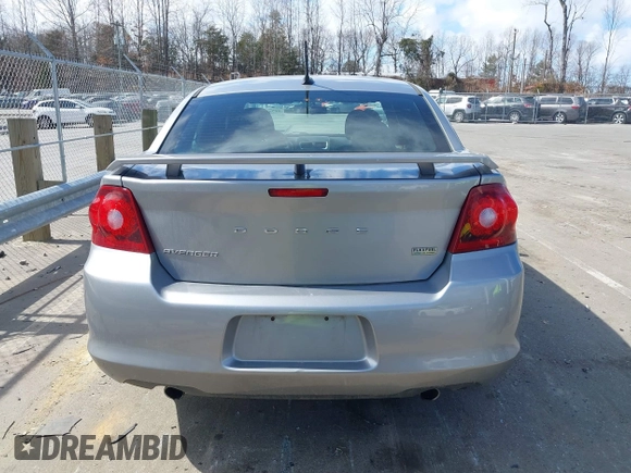 2013 Dodge Avenger SE V6 with VIN 1C3CDZAG2DN696519, listed as a IAAI auction lot 41705189 with 154,573 mi miles and . Bid and sale history available at DreamBid. Image 16.