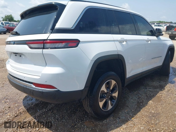 2023 Jeep Grand Cherokee with VIN 1C4RJYB63PC649000, listed as a IAAI auction lot 42306975 with 29,948 mi miles and . Bid and sale history available at DreamBid. Image 4.